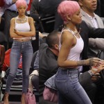 Rihanna sports a new pink hairstyle at The Clippers game
